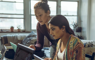 A women practicing databases in laptop